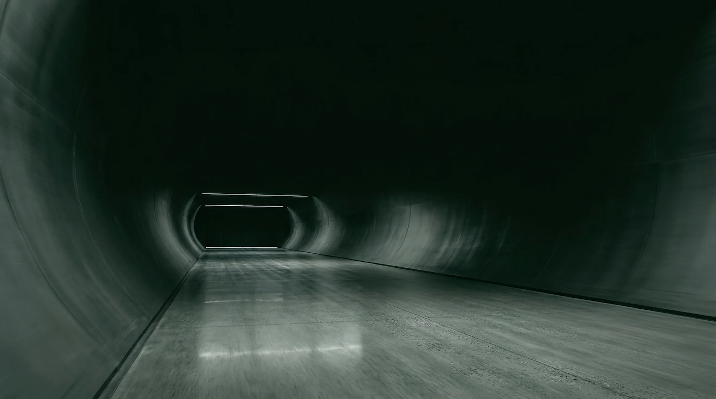 Dark tunnel with a razor-thin bright exit slit ahead - polished floor carrying the light forward