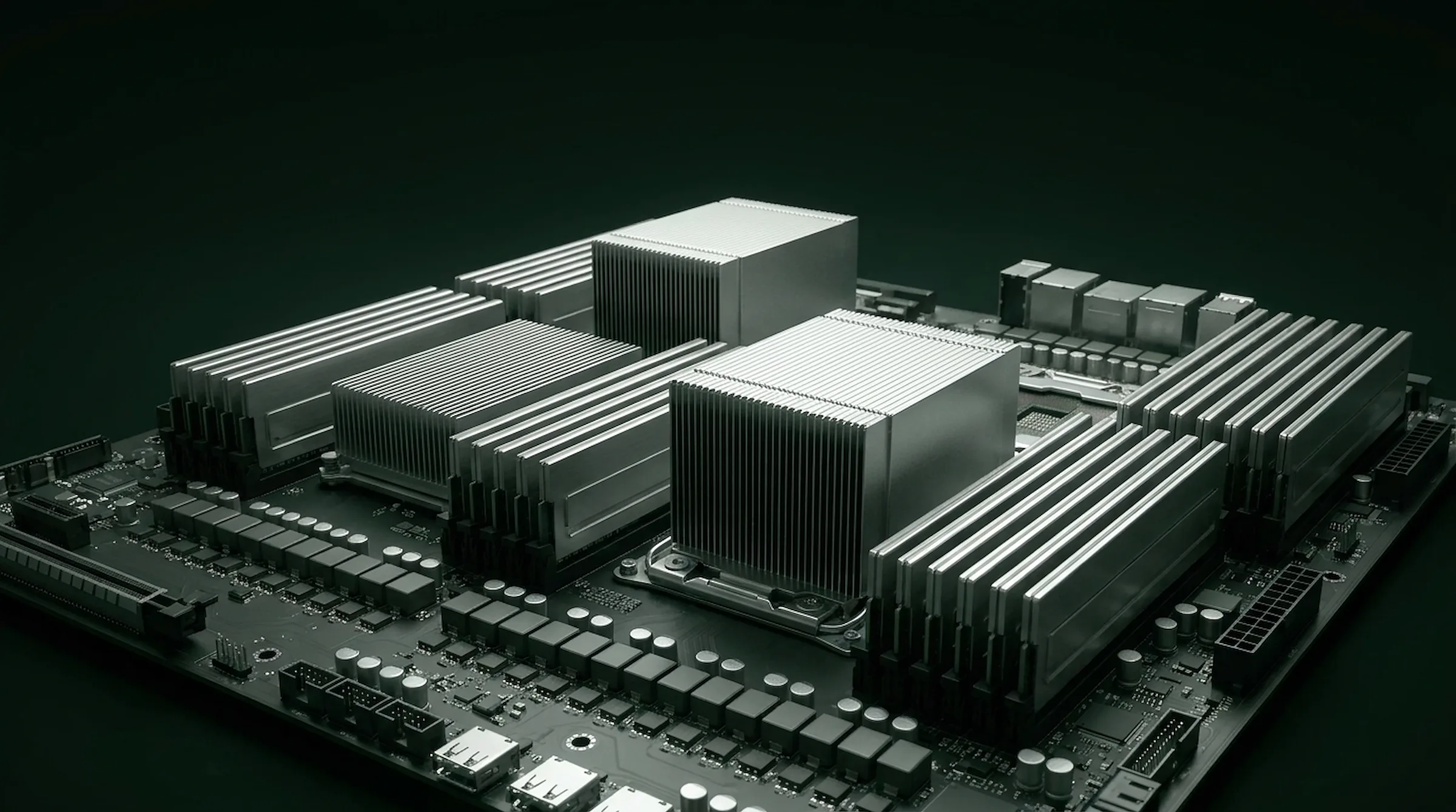 Server board render - silver CPU heatsinks and banks of memory rising from a dark motherboard