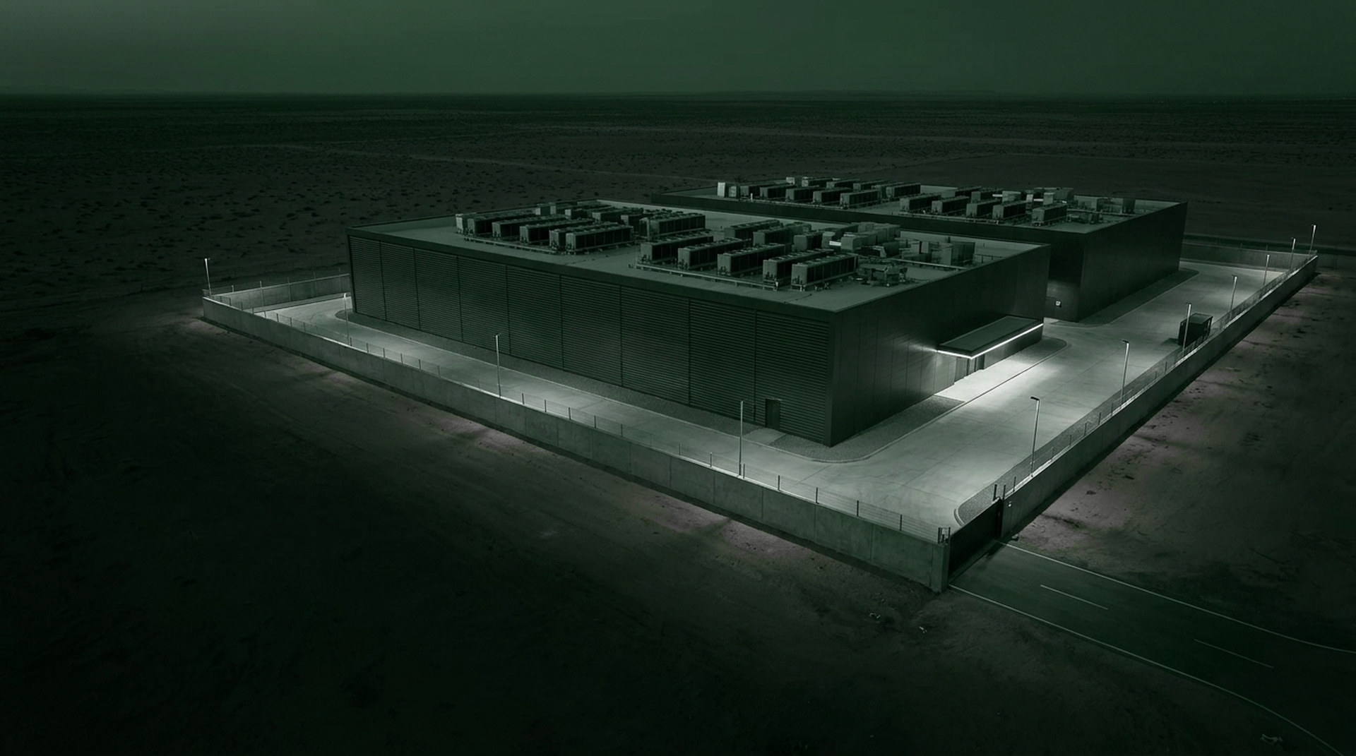 Sovereign data centre campus at dusk in the Saudi desert